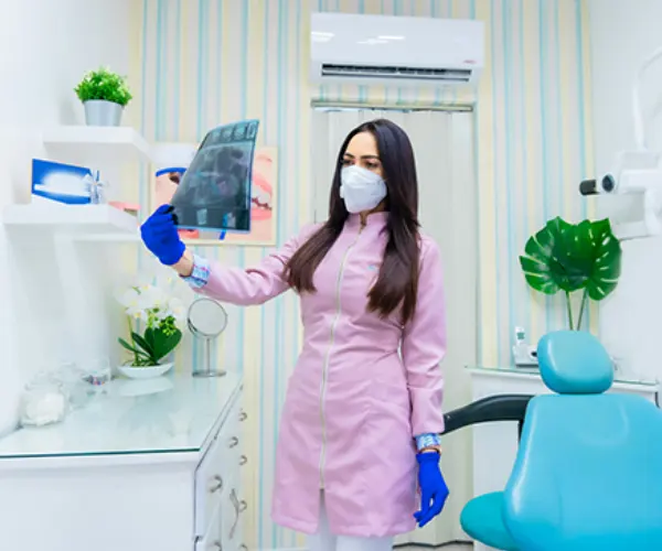 dentist examining teeth x-ray